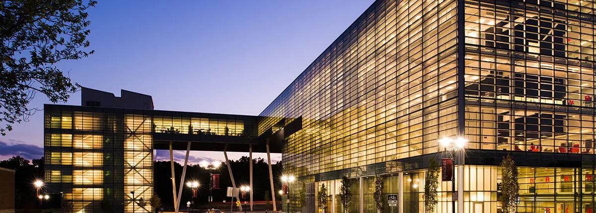 view of rutgers business school building in new brunswick at night