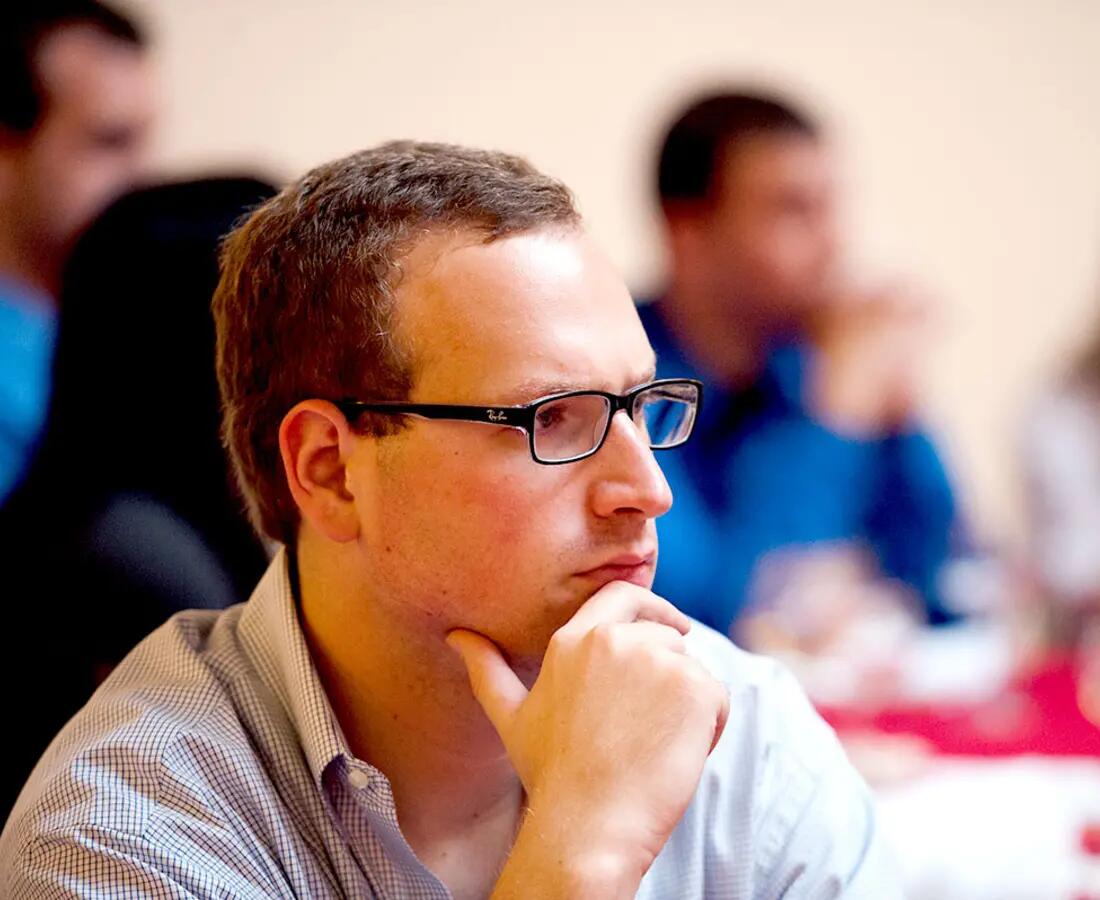 Closeup of a man's face as he looks to the right