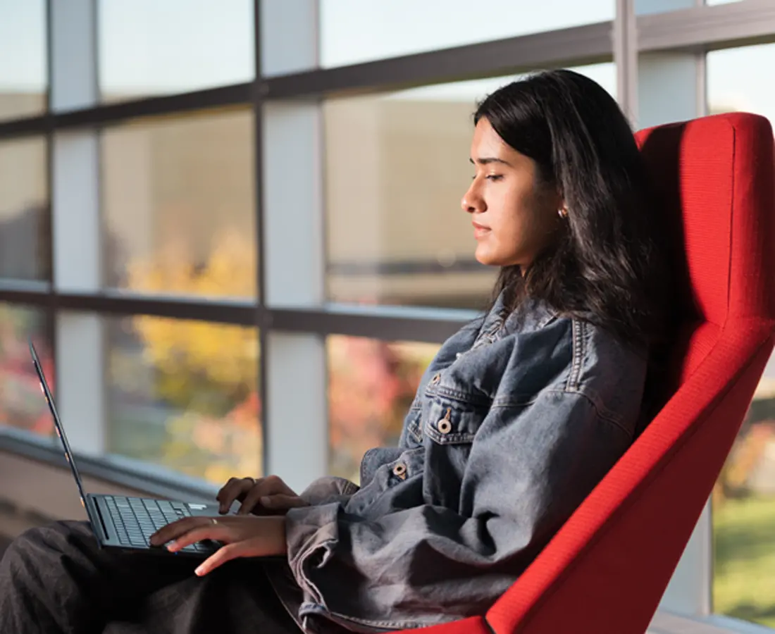 Student sitting at computer