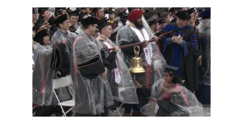 Ringing the RBS Commencement Bell.