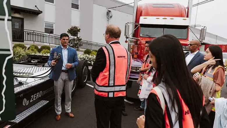 Jeffrey Hermann, CEO of Herman Services Inc., explains the characteristics of his fleet's electrical tractor trailers.