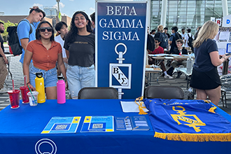 students with a student club tabling
